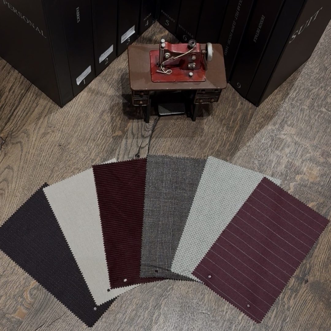 Overzicht van verschillende hoogwaardige stoffen waaruit je kunt kiezen voor een maatpak op maat bij Qemmo